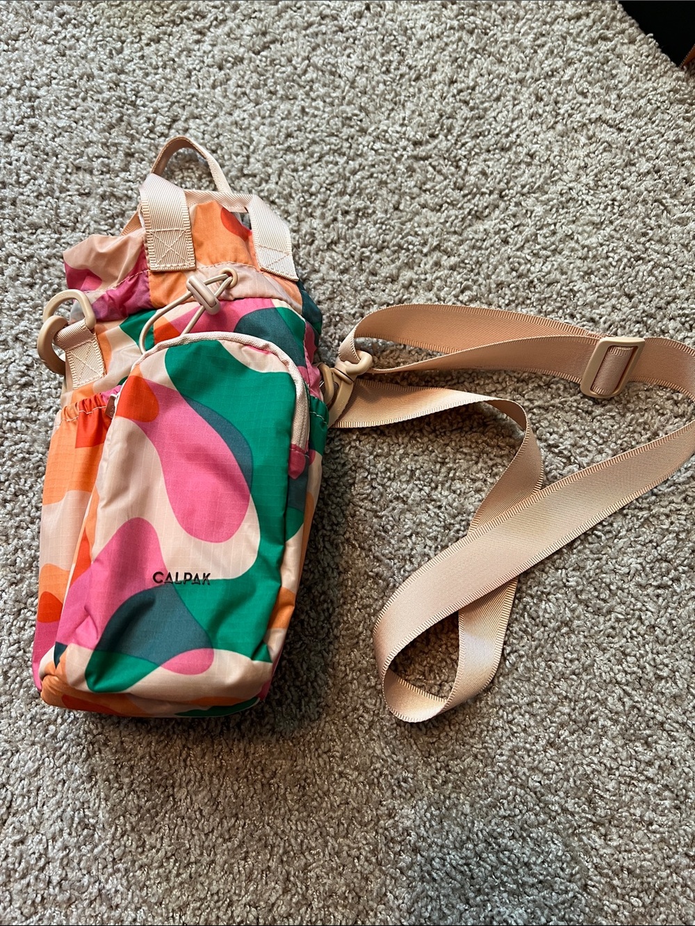 Calpak Pink Orange Green Abstract Print Water Bottle Sling